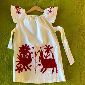 Beautifully embroidered by hand new dress perfect for a special event! Size 4